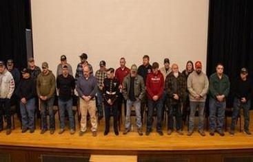 Marathon Honors Veterans During Flag Raising Ceremony